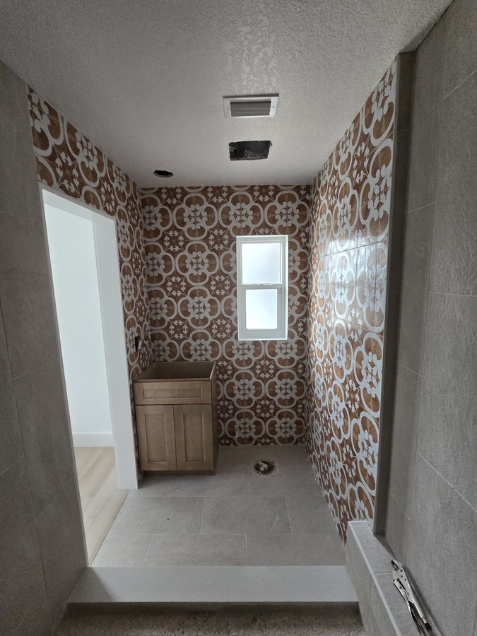 Decorative patterned tile installation in a St. Petersburg, FL home