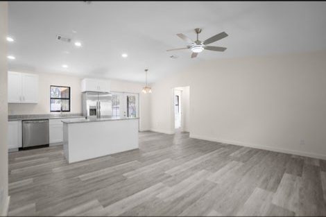 Luxury vinyl plank flooring installed in an open-concept Florida home